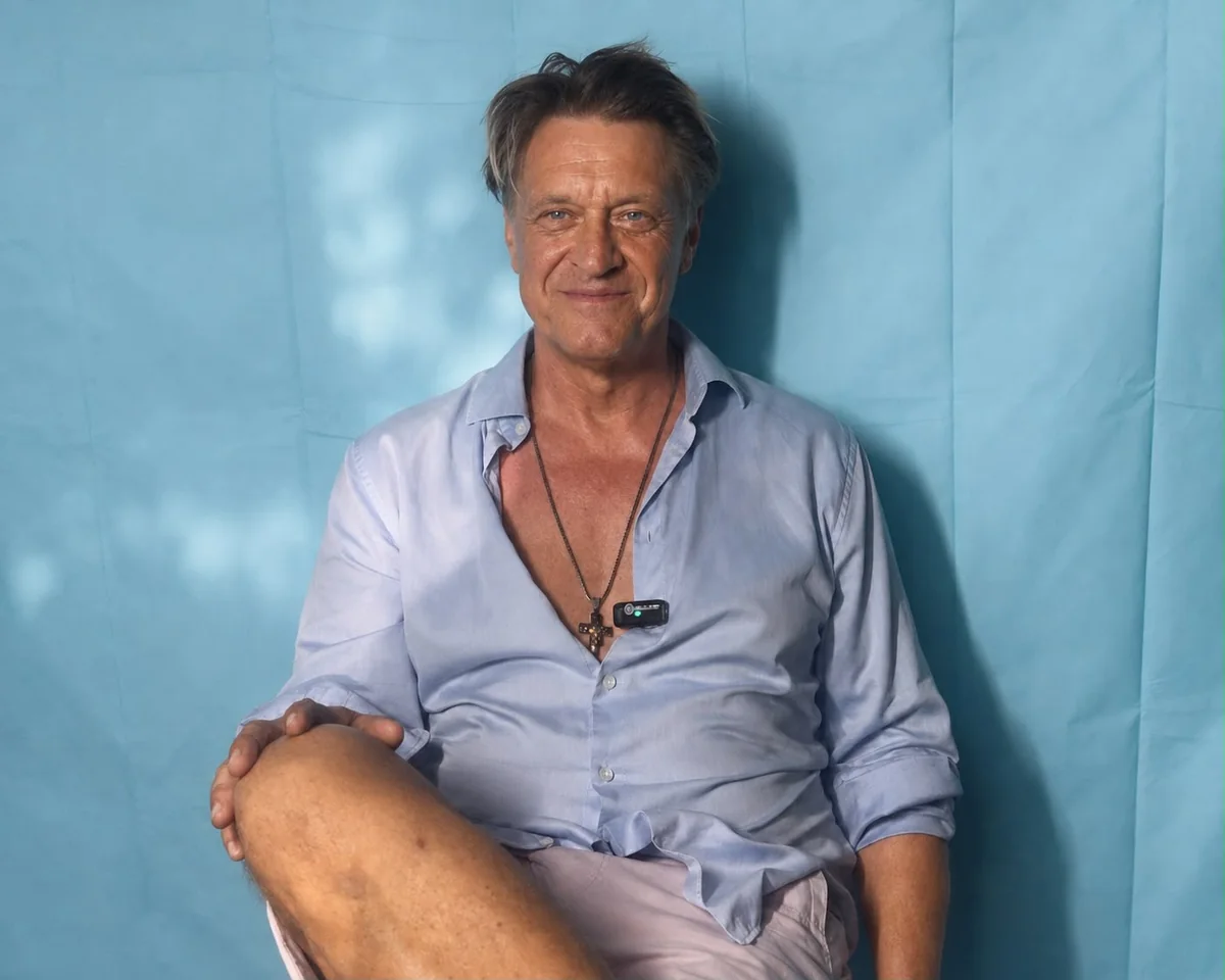 Andreas Maria Schwaiger, casual actor portrait in pale-blue shirt